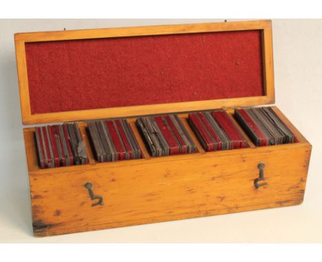 A COLLECTION OF APPROXIMATELY 80 SATIRICAL LANTERN SLIDES, in wooden case, to include Westminster Gazette cartoons, some dupl