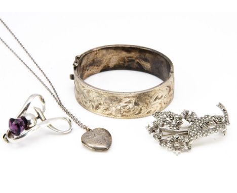 A silver heart shaped locket and chain, a Charles Horner hat pin top/brooch af, a silver hinged bangle and a base metal and m