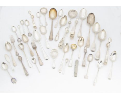 A collection of silver spoons and other flatware, including several tablespoons and dessert spoons, a quantity of teaspoons a