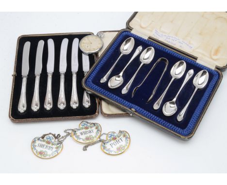 A cased set of six George V silver teaspoons with sugar tongs, together with a cased set of six silver handled butter knives,