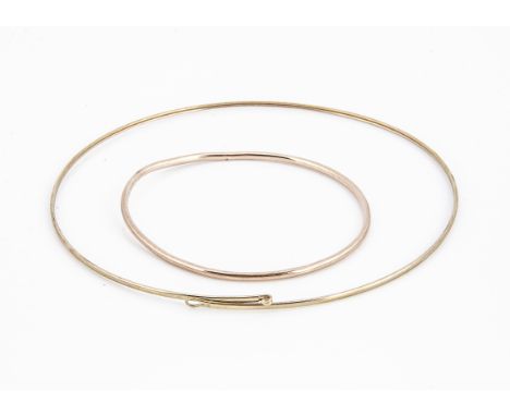 An early 20th Century misshapen circular 9ct gold bangle, together with a contemporary 9ct gold torque necklace, 14g