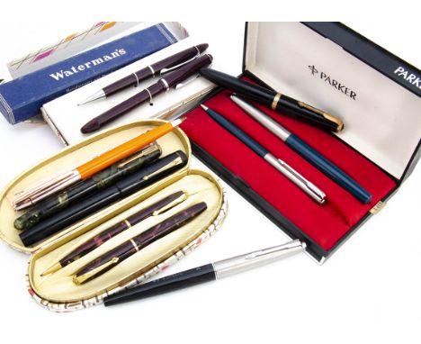 A collection of vintage and modern pens, including a Conway-Stewart writing set in original boxes, fountain pen and pencil, t
