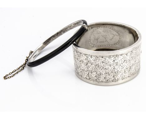 A continental silver and enamel hinged bangle, bearing French strike marks, 6cm x 5.2cm together with a Victorian silver hing