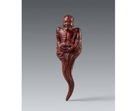 Netsuke eines Mannes, aus Wolken emporsteigend. Nadelholz, schwarz und rot lackiert. 19. Jh.Ungewöhnliche Darstellung eines k