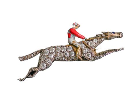 A charming Art Deco Diamond and Enamel Jockey Brooch, circa 1925,  designed as a racehorse with jockey up, at full gallop, th