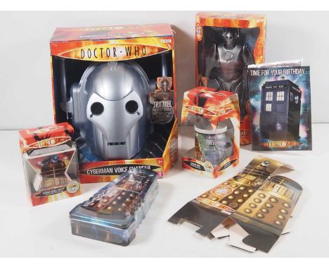 A selection of DOCTOR WHO vintage toys to include a fully poseable Cyberman, a Cyberman voice changer helmet and various Dale