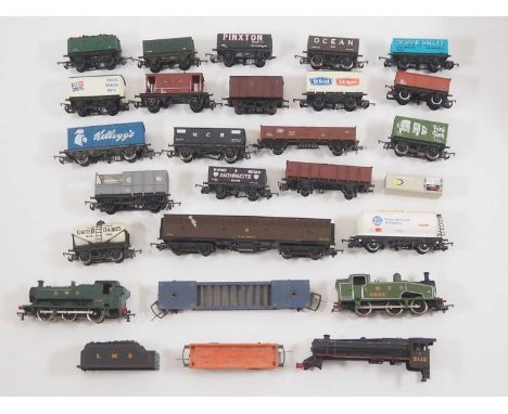 A group of unboxed OO gauge steam locomotives and rolling stock by HORNBY, LIMA and others, together with a spare HORNBY loco