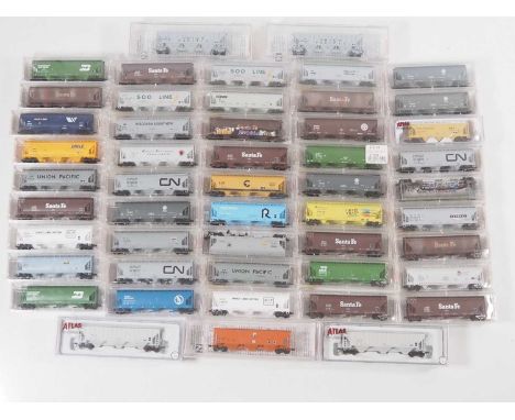 A group of American and Canadian Outline N gauge covered Hopper cars mostly by MICROTRAINS in various liveries - VG/E in VG b
