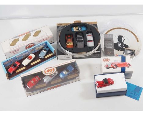 A selection of DINKY and CORGI diecast models comprising - a DINKY Triumph Dolomite, DINKY classic sports car sets 1 and 2 an