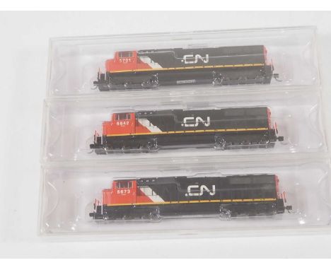 An ATHEARN triple pack of Canadian Outline N gauge diesel locomotives comprising 3 x SD70I class diesel locomotives, all indi
