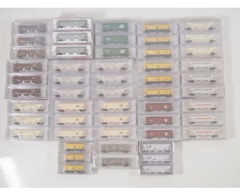 A group of American and Canadian Outline N gauge covered Hopper wagon packs by INTERMOUNTAIN, PACIFIC WESTERN RAIL SYSTEMS an