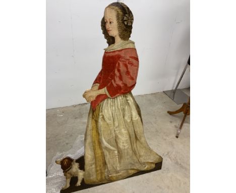 A wooden half scale image of Mary Anning, Lyme Regis fossil Hunter. W:81cm x D:1cm x H:123cm