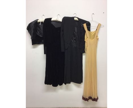 A collection of four vintage fashion items to include a 1930s chiffon and silk gown with covered buttons (some staining to bu