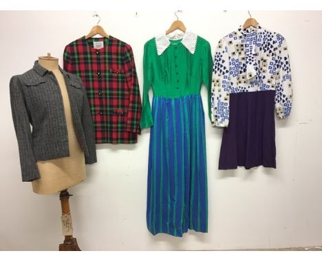 A 1960s Jaegar wool jacket, a 1960s dress with pussy bow tie, a 1970s raw silk long dress and an Irish wool jacket. 