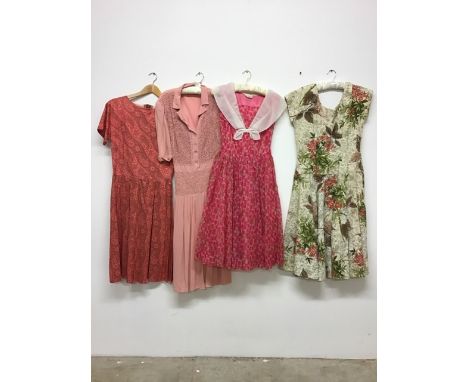 Four vintage dresses to include a 1930s crepe soutache panelled day dress (slight staining on sleeve), a 1950s cherry print t