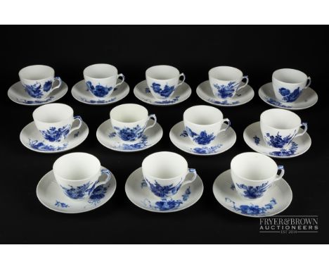 A matched set of twelve Royal Copenhagen porcelain 'Blue Flowers' pattern teacups &amp; saucers, mostly shape 1870 (12)