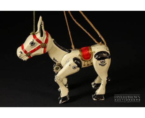A vintage cast metal Muffin the Mule puppet, jointed limbs, 14cm long approx.