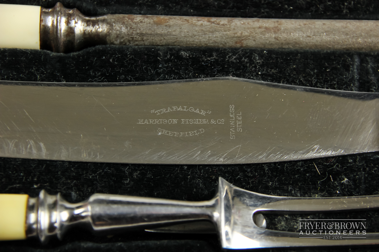 A bone handled stainless steel carving set, Walker & Hall, Sheffield