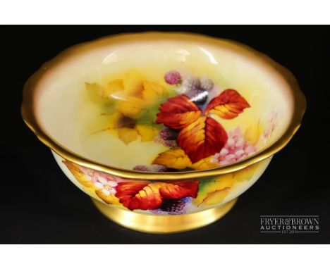 A Royal Worcester porcelain fruit bowl, decorated by Kitty Blake with flowering and fruiting blackberry canes, graduated gild