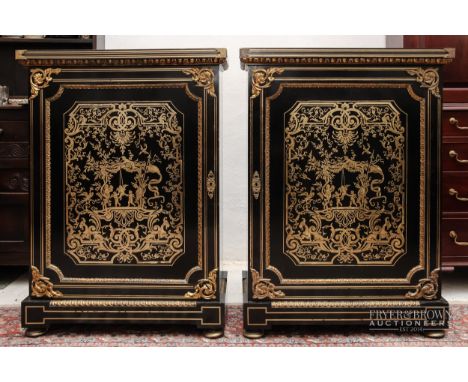 A pair of Napoleon III ebonised boullework pier or side cabinets with ormolu mounts, c1870, the single door inlaid with cut b