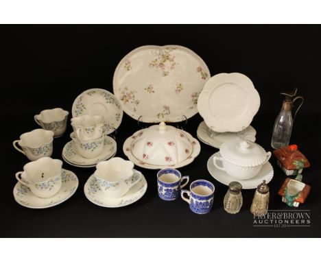 A Crown Staffordshire 'Rock Garden' pattern part tea service, comprising six teacups &amp; five saucers; together with three 