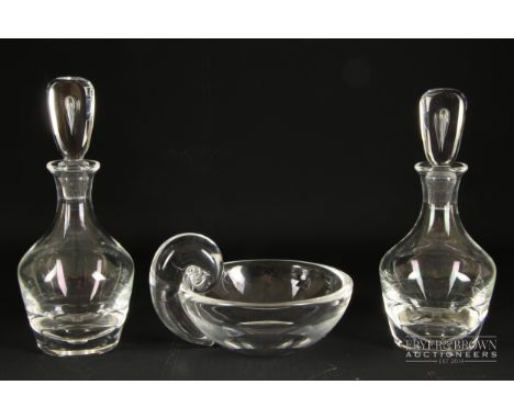 Two Steuben teardrop liqueur decanters with air inclusions; and a John Dreves for Steuben shell scroll bowl, script engraved 