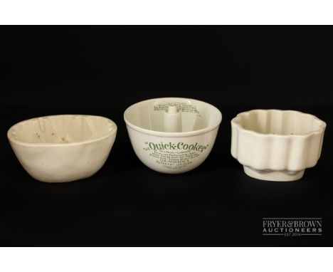 Kitchenalia - two vintage ceramic jelly moulds; and a 'Quick-Cooker' by Grimwades (3)