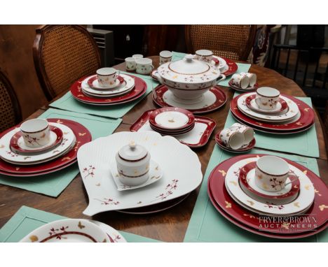 A Phillipe Deshoulieres porcelain part dinner, tea and coffee service, burgundy with gilt butterflies and white with gilt, co