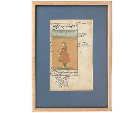 An Islamic Mughul painting / manuscript. Of a prince smelling a flower, frame size 35.5 x 26cm.Provenance: Bought in Camden P