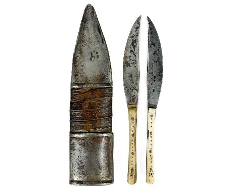 An Islamic bone handled knife set, 19th century. The two bone handled knives in a leather bound and white metal scabbard, sig