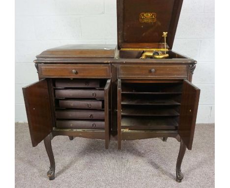 A Victrola Electrola record player and music cabinet, early 20th century, number VE220, together with assorted vinyl records,