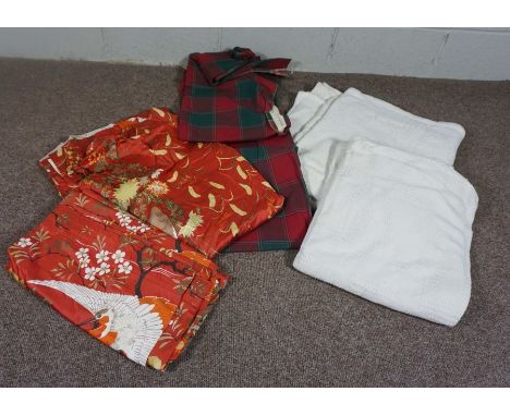 A box of assorted curtains and sofa throws