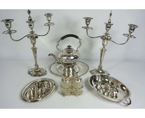 An assortment of silver plate, including a pair of Georgian style three light candelabra, a hot water jug, sugar bowl and cre