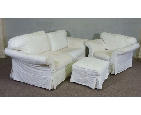 A modern three seater sofa, armchair and ottoman, currently with white linen covers (3)