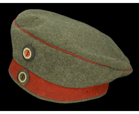 A Prussian Feldmutze. A good upper size, possibly 56 or 57 field grey feldmutze. Standard material, red piping to the crown w