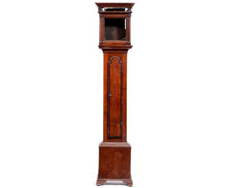 A George III oak longcase clockcase, the flat topped hood formerly with blind fret cornice, turned pilasters flanking the gla