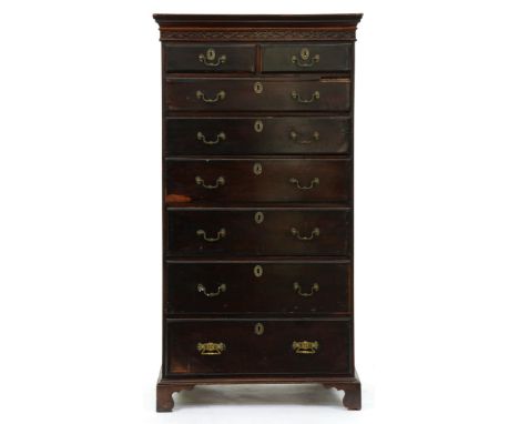 A mahogany tallboy, early 20th c, with blind fret carved cornice and brass handles and escutcheons, bracket feet, 160cm h; 48