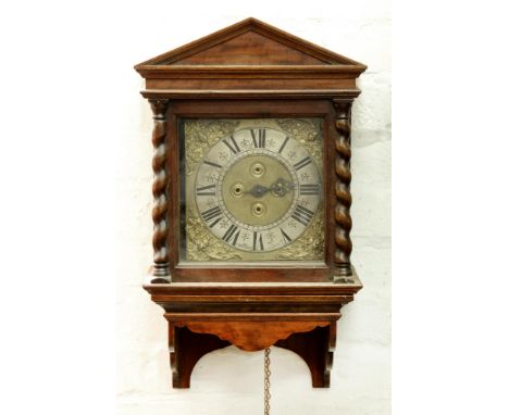 An English walnut thirty hour hooded wall clock, William Brock, dated 1705, the 9" brass dial with matted centre, four ringed