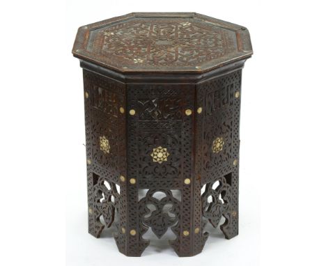 A Indian carved and mother of pearl inlaid octagonal table, late 19th c, 50cm h; 43 x 43cm  Slight losses, old chip on edge