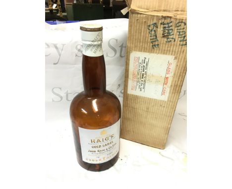 A large Haigs Blended Scotch Whisky Gold Label empty advertising bottle. 40cm tall.