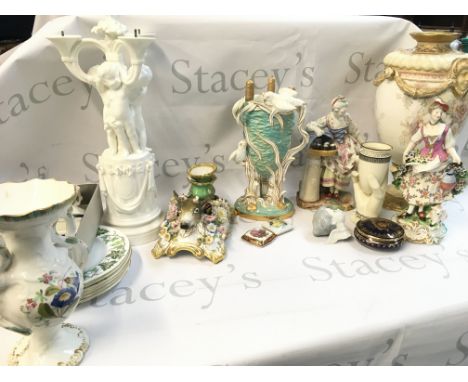 A collection of ceramics including Lladro, Derby, Copeland bird vase, Minton cherub vase, Buslem ware Royal Doulton urn, clas
