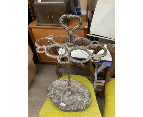 A vintage snake design umbrella/ stick stand.