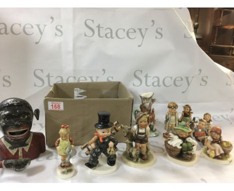Box of vintage Hummel figurines from Japan.