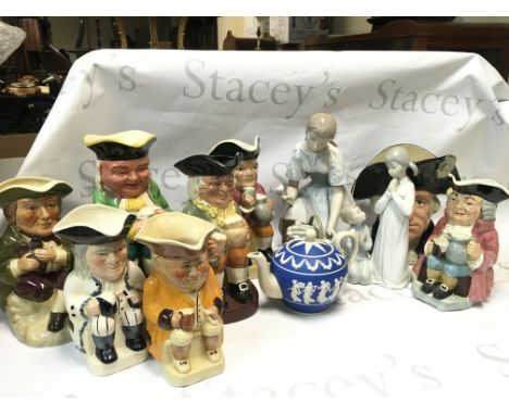 A Collection of ceramics including Toby jugs, Lladro figures, Wedgwood small tea jug, Doulton George Washington character jug