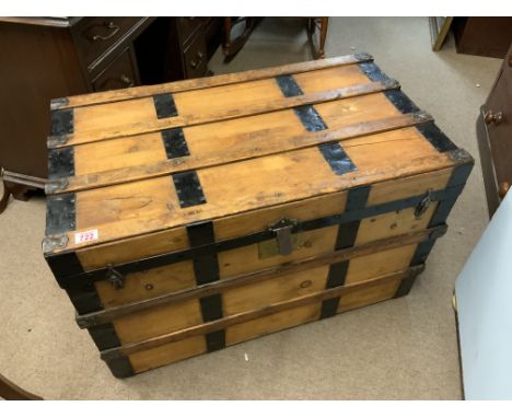 a large antique pine and metal bound trunk. 87cm x 49.5cm x 54cm