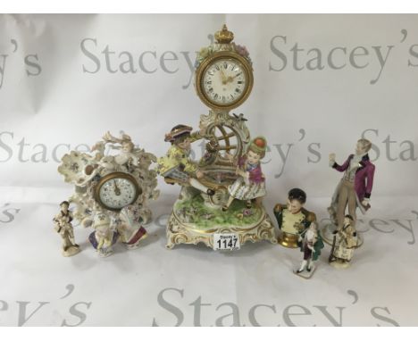 A collection of small busts with ceramic figures and a ceramic clock. NO RESERVE