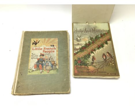 WITHDRAWN Two Christmas books including little french people by K J Fricero Postage B. NO RESERVE