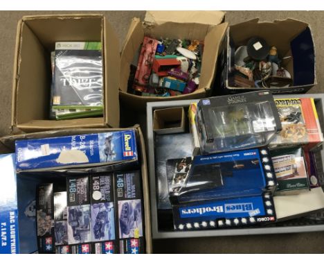A large collection of toys including boxed Corgi Ford thunderbird, Tamiya boxed model kits including Sherman Tank, Cargo truc