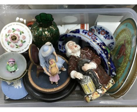 A collection of ceramics including a mantle clock with a Swiss movement, Country Artists a royal bouquet figure group,