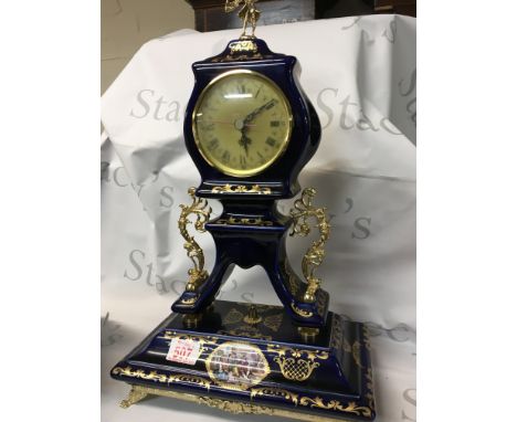 Vintage cobalt blue porcelain mantle clock. Blue and white with golden colours, made by Alfa.